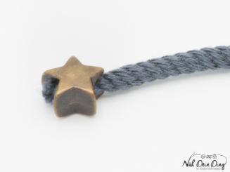 Kordelende Stern messing 