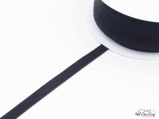 Trägergummi, schwarz, mit samt- artiger Oberfläche 